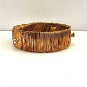Gold tone wire wrapped bangle bracelet